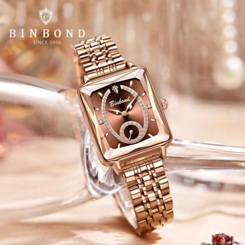 ساعت مچی زنانه بین باند زیر ثانیه فعال رنگ ثابت ضداب قفل استیل پروانه ای شب نما اورجینالBIN